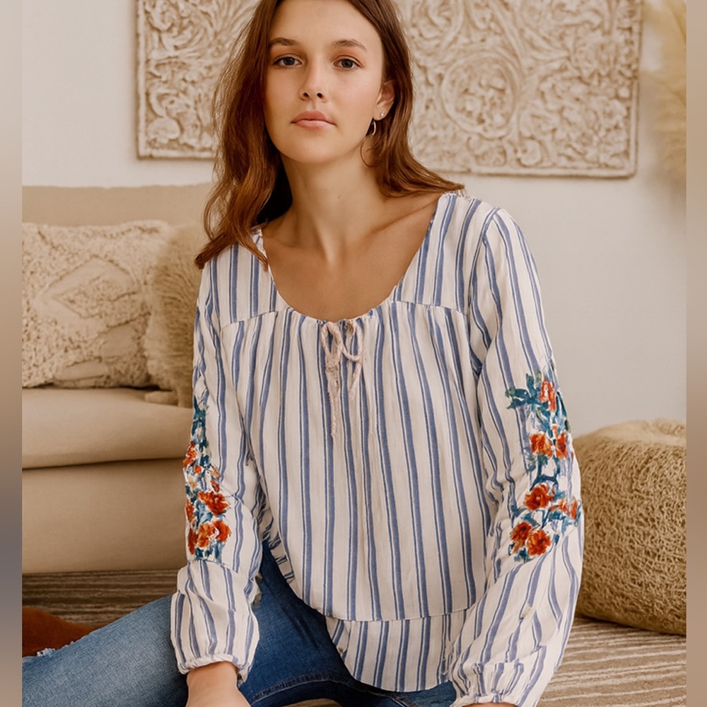 Hollister White and blue striped top with floral embroidery on the sleeves